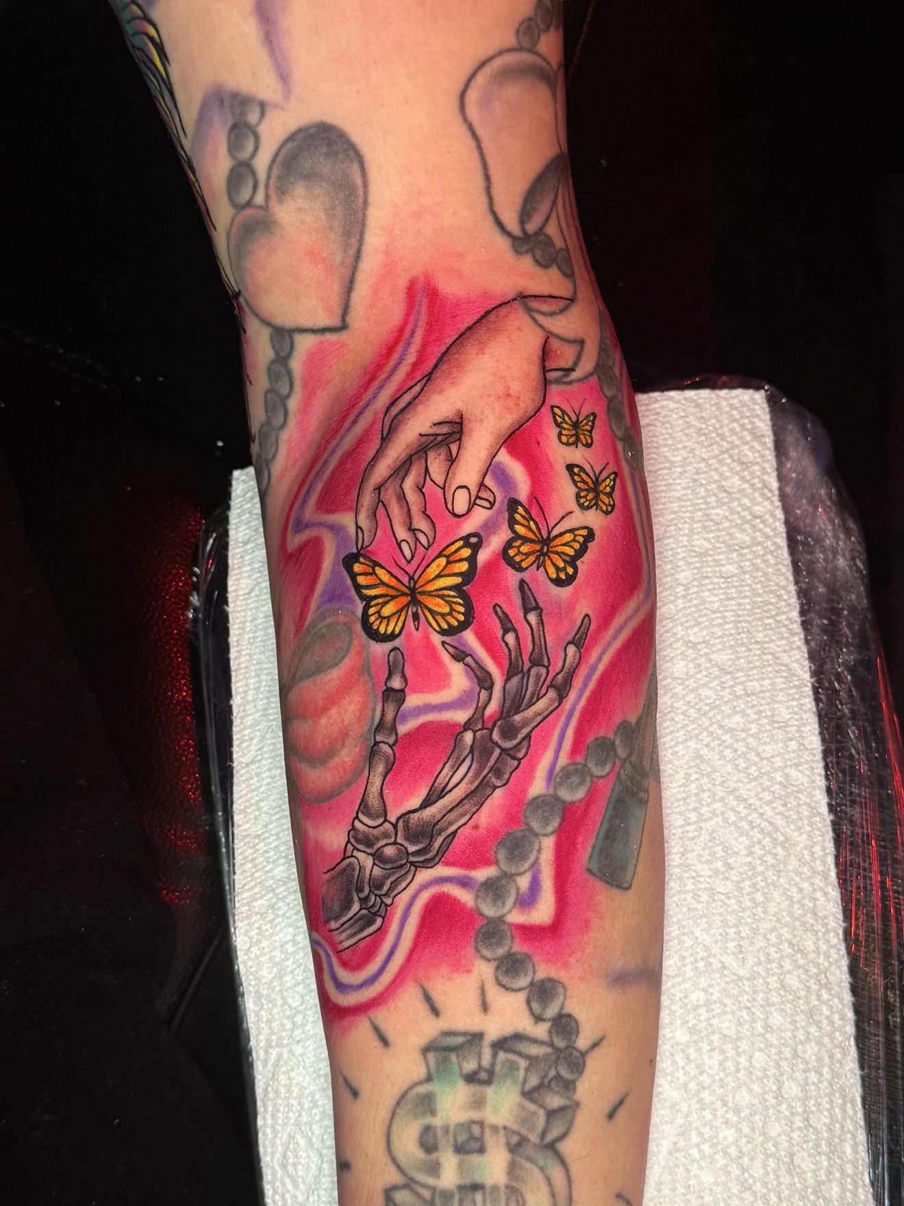 Butterfly skeleton hand tattoo